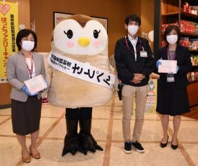 主催者とイオンスタイル碑文谷店長との写真