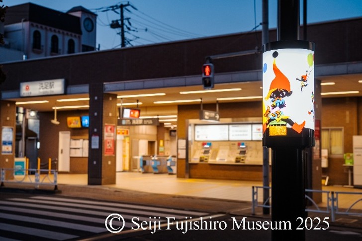 洗足商店街の影絵街路灯の写真